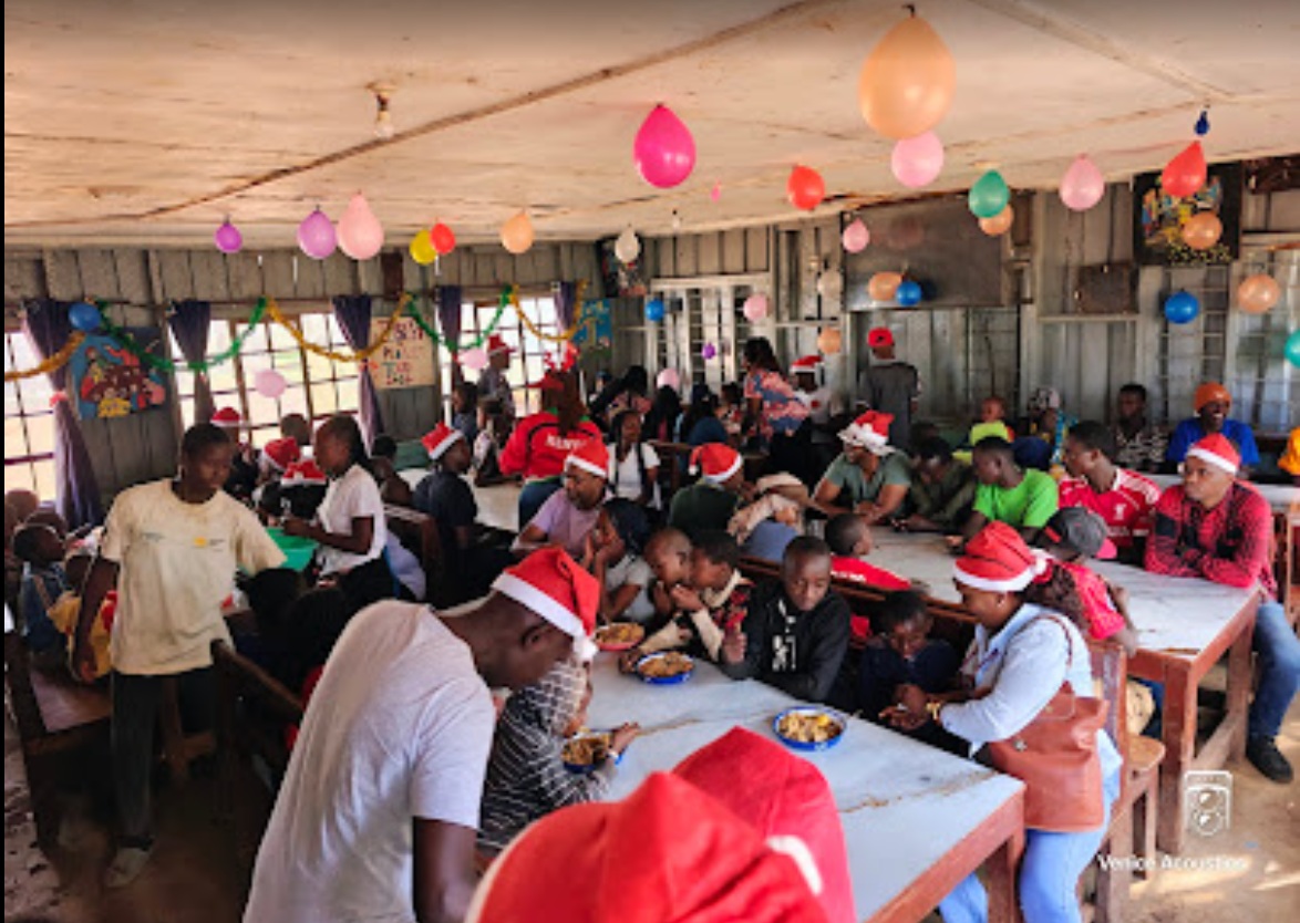 Riders and children during holiday lunch